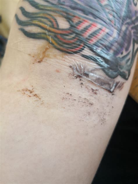 second skin tattoo leaking|A lot of build up under second skin. Should it be taken。